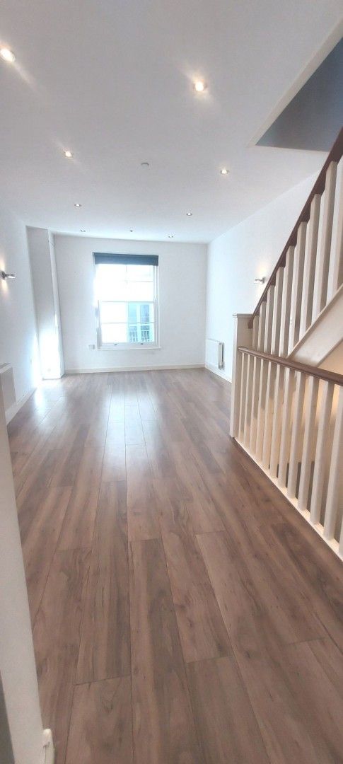 living room w stair up to bedrooms